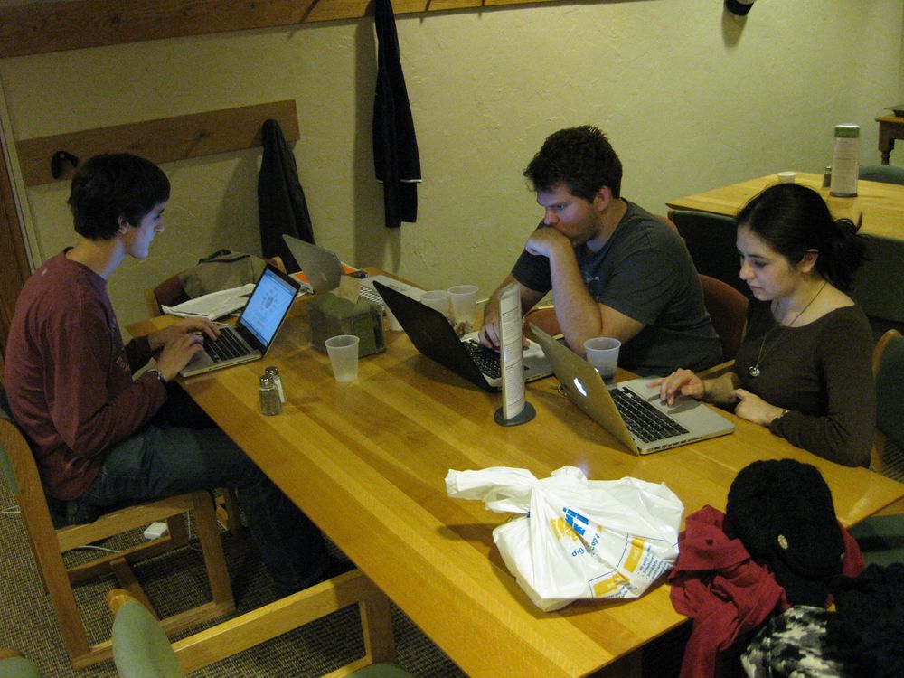 Students discussing and planning together at a table