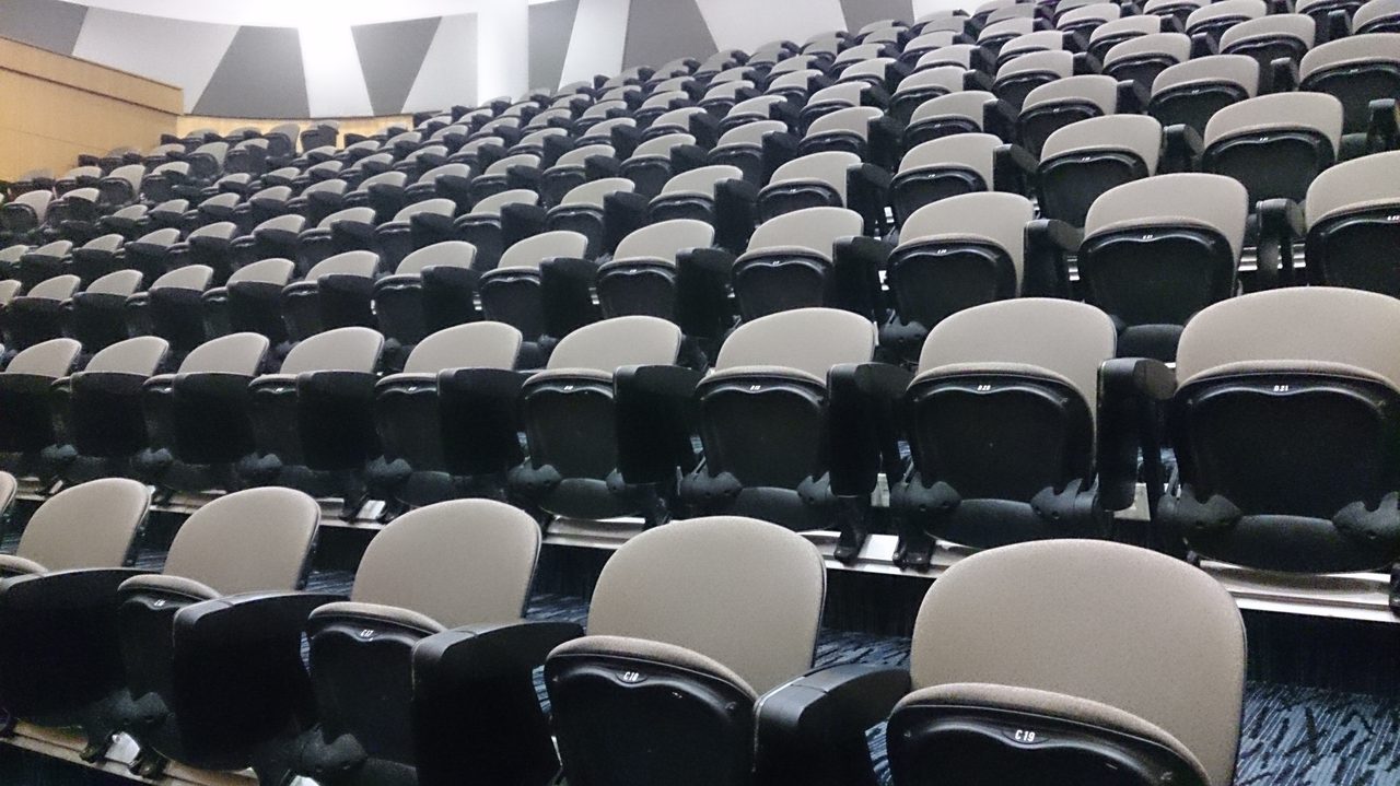 Rows of empty seats in a lecture hall